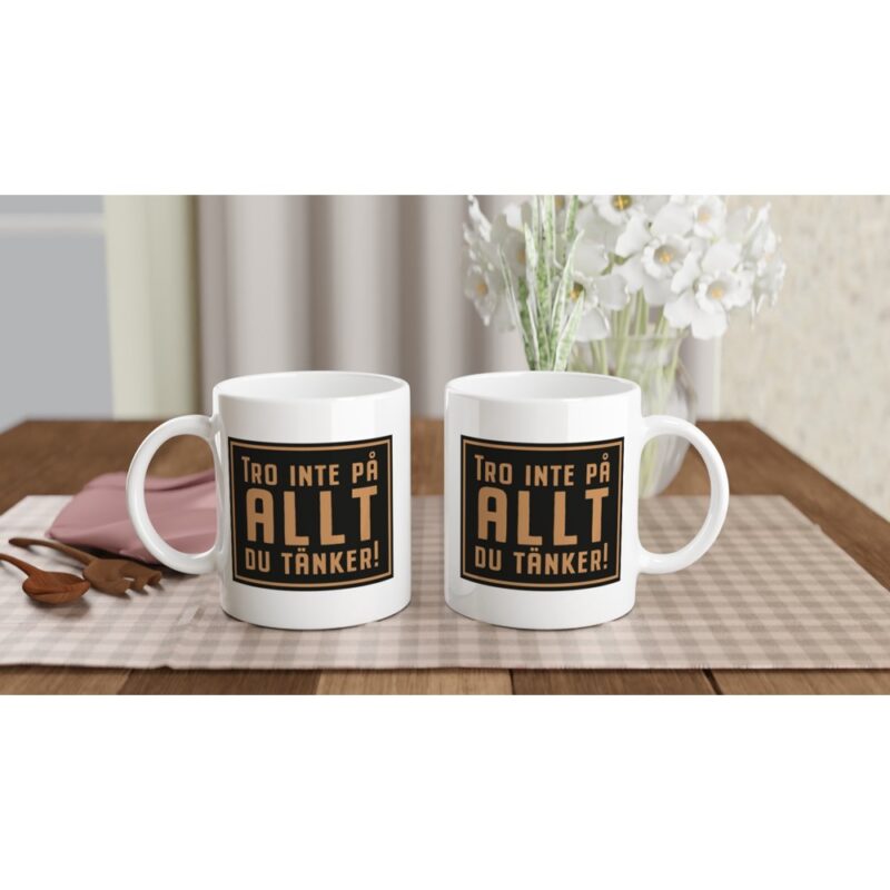 Vit keramisk mugg Tro inte på allt du tänker! Väggkonst
